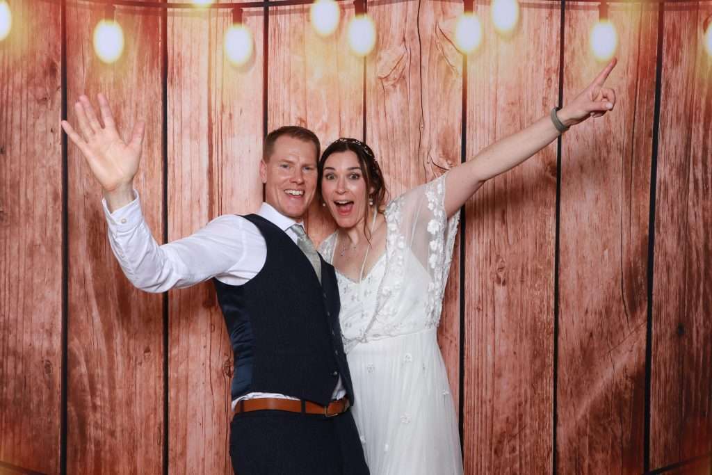 Bride & Groom using the Photobooth for Getting Married in Yorkshire 2024